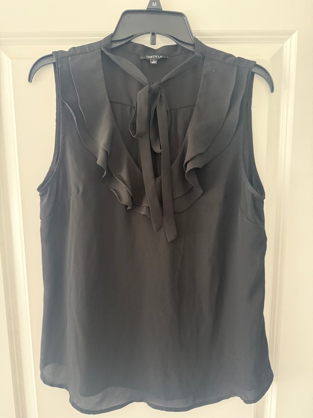 Black Ruffle Tie-Neck Sleeveless Blouse